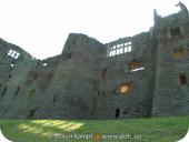 0159 Raglan Castle Sun On Grass Back of Buttery and Pantry.jpg